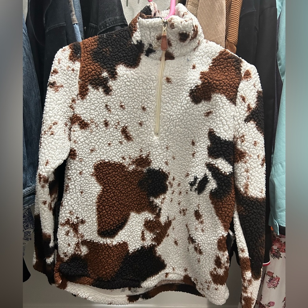 Cow print Sherpa. XSmall fits bigger. Worn once
